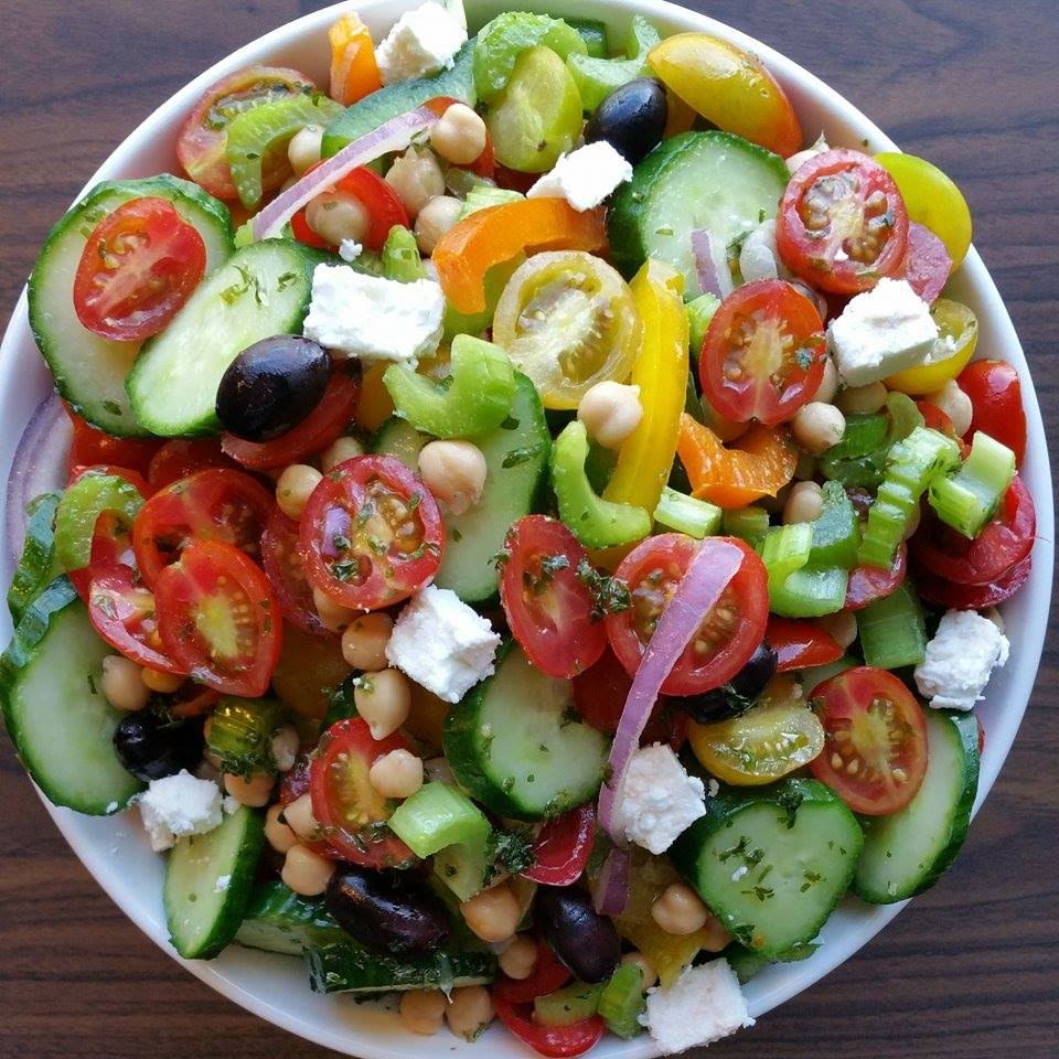 What Are the Best Summer Food Items to Stay Cool? 6 Fresh vegetable salad with cucumber tomato and onion a light and hydrating summer food item