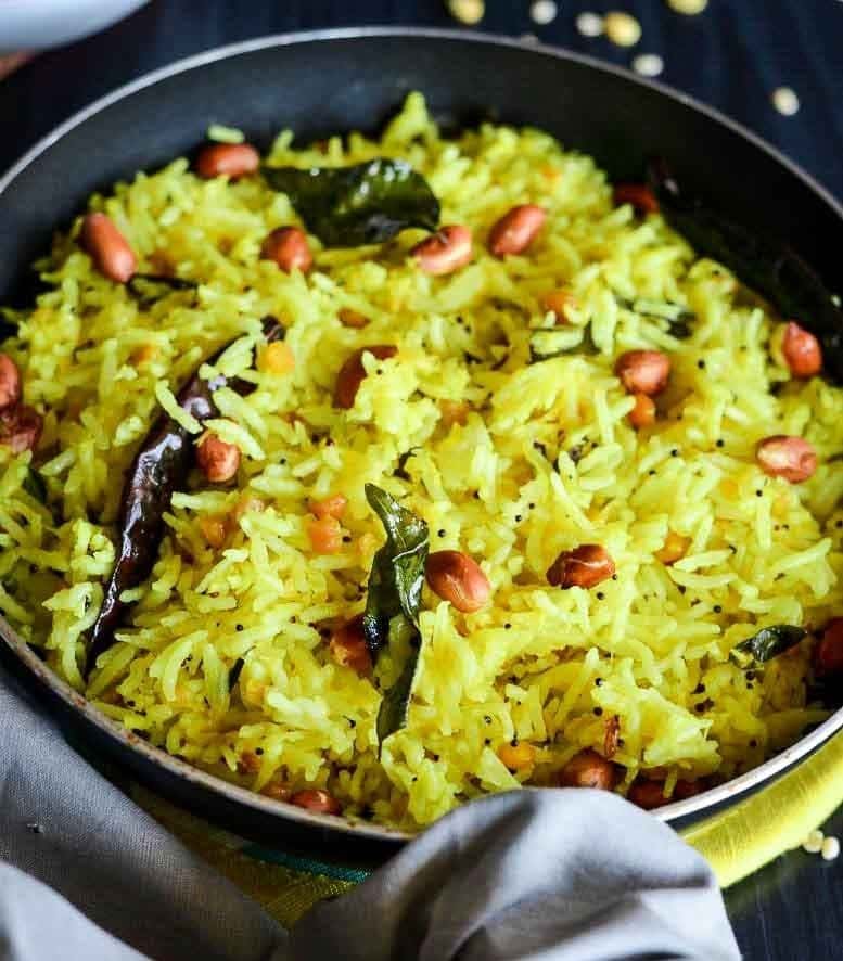 What Are the Best Summer Food Items to Stay Cool? 3 Lemon rice served with peanuts curry leaves and turmeric a light and zesty summer food item