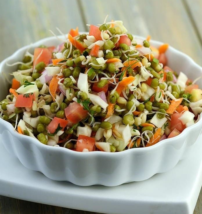 What Are the Best Summer Food Items to Stay Cool? 7 Sprouts salad made with moong sprouts cucumber and tomato a light and healthy summer food item
