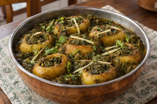 Jannat-e-numa (Stuffed Potatoes in Spinach Sauce) 5 Homemade Jannat-e-numa (Stuffed Potatoes in Spinach Sauce), ready to serve