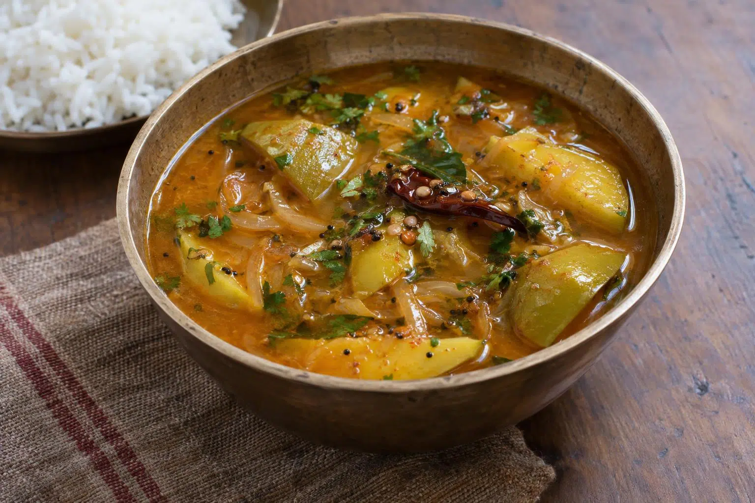 Homemade Kairi Khatta (Raw Mango Gravy), ready to serve