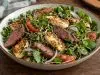 Homemade Rosemary Lamb and Haloumi on Herb Salad, ready to serve